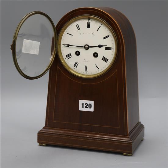 An Edwardian inlaid mahogany mantel clock